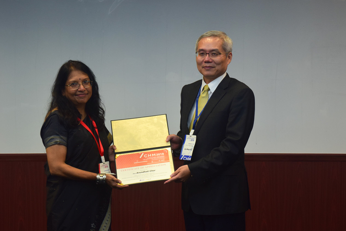 Presenting Certificates- Group photo of Prof. Sy-Ming Guu and Dr. Arundhati Char (left)